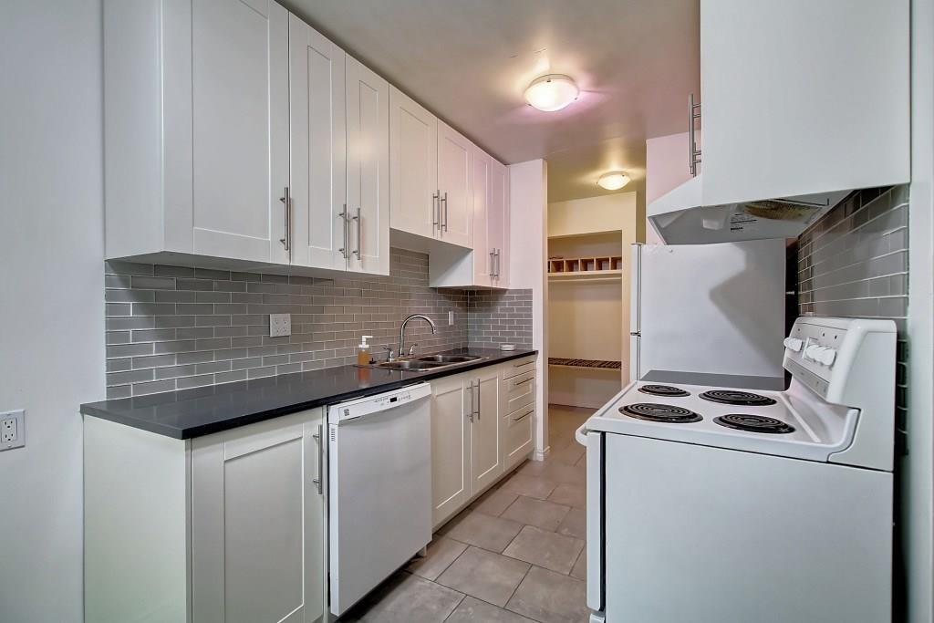 #305 10730 105 St NW  