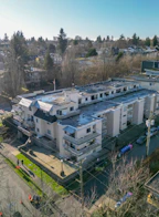 303 975 E Broadway