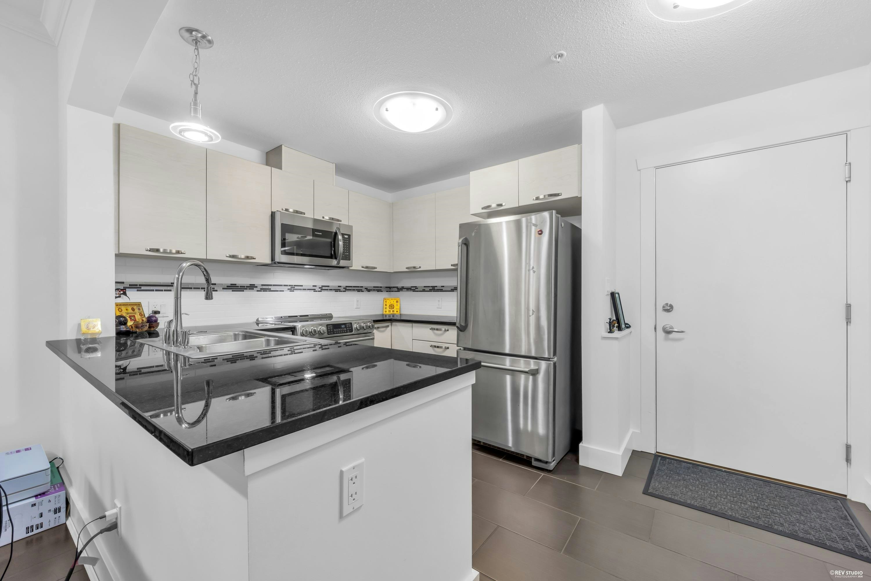 203-7418 Byrnepark Walk, Burnaby, BC, V3N 0B3 - 7