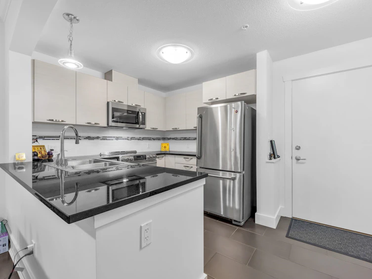 203-7418 Byrnepark Walk, Burnaby, BC, V3N 0B3 - 7