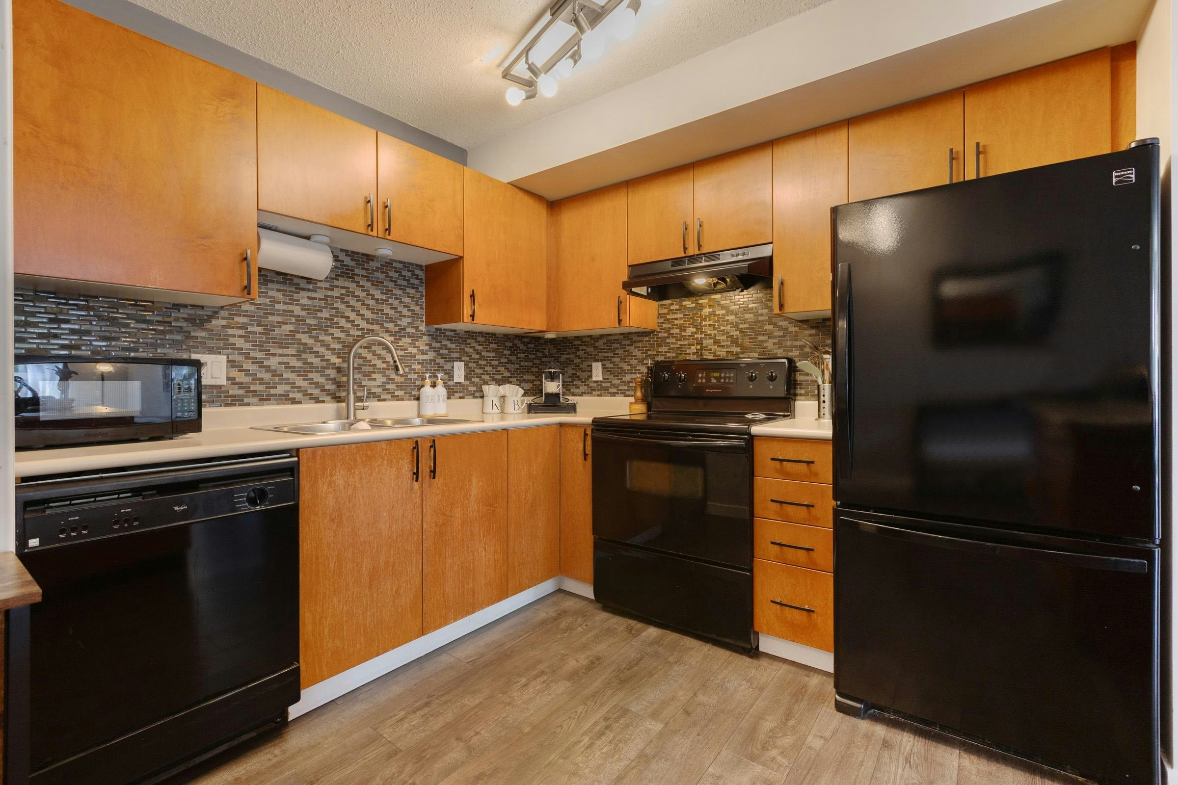 306-5465 203 Street - 5