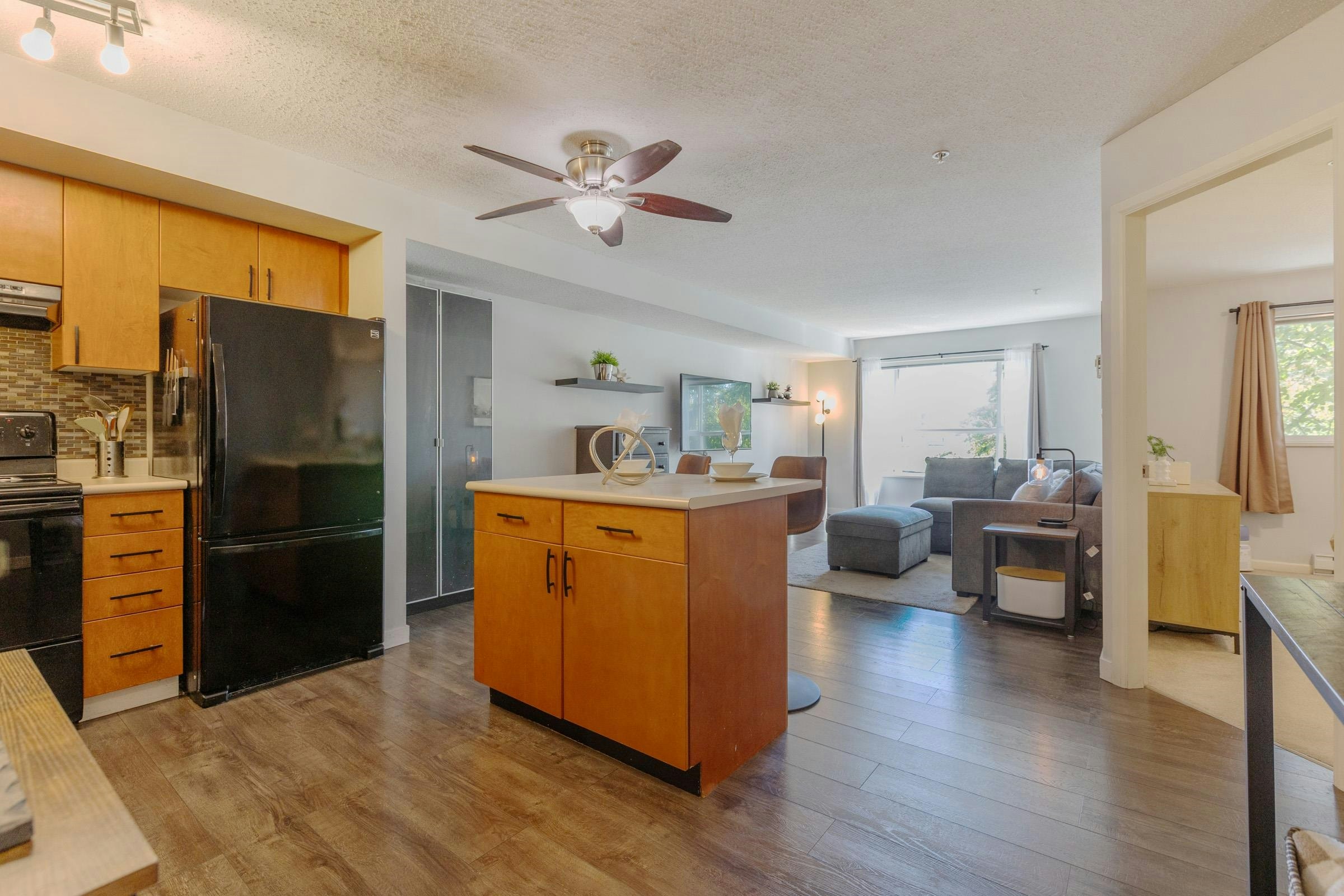 306-5465 203 Street - 2
