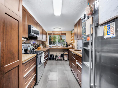 132-7476 138 Street - 4