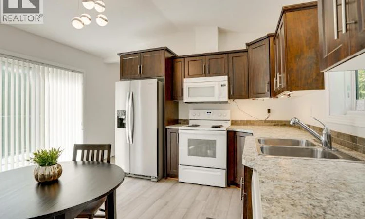 104-8430 Springbrook Road