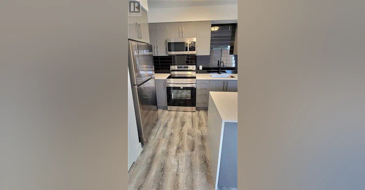 102-6065 Mcleod Road, Niagara Falls, ON, L2G 0Z7 - 2