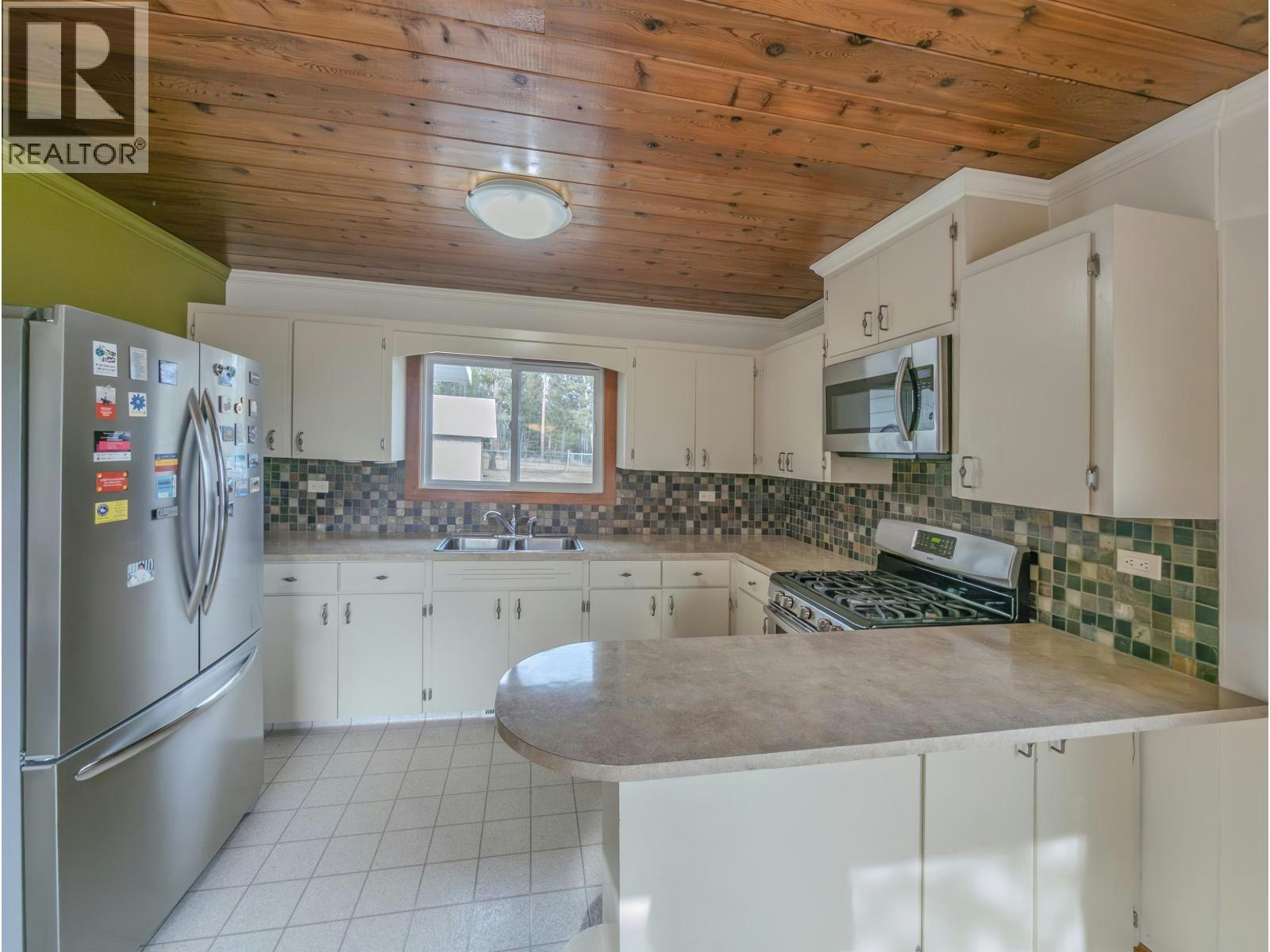 4734 Kitwanga Drive - 4