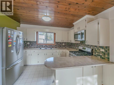 4734 Kitwanga Drive - 4