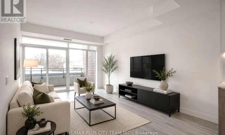 303-1285 Queen Street E