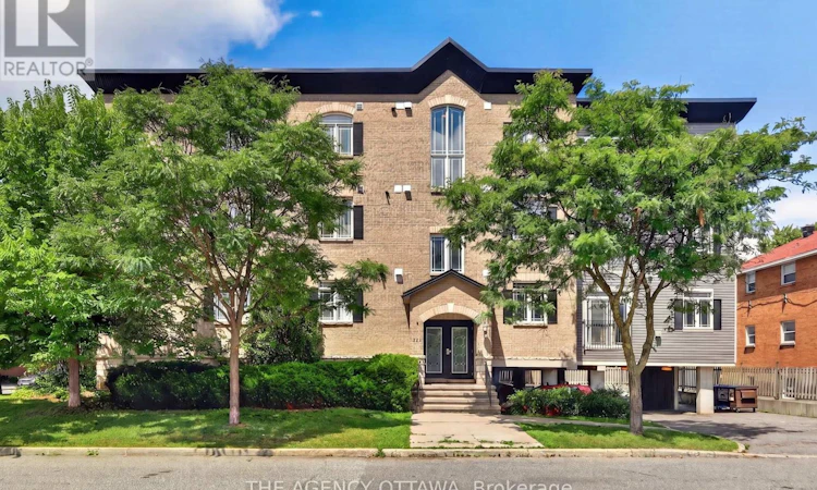 203-711 Churchill Avenue N