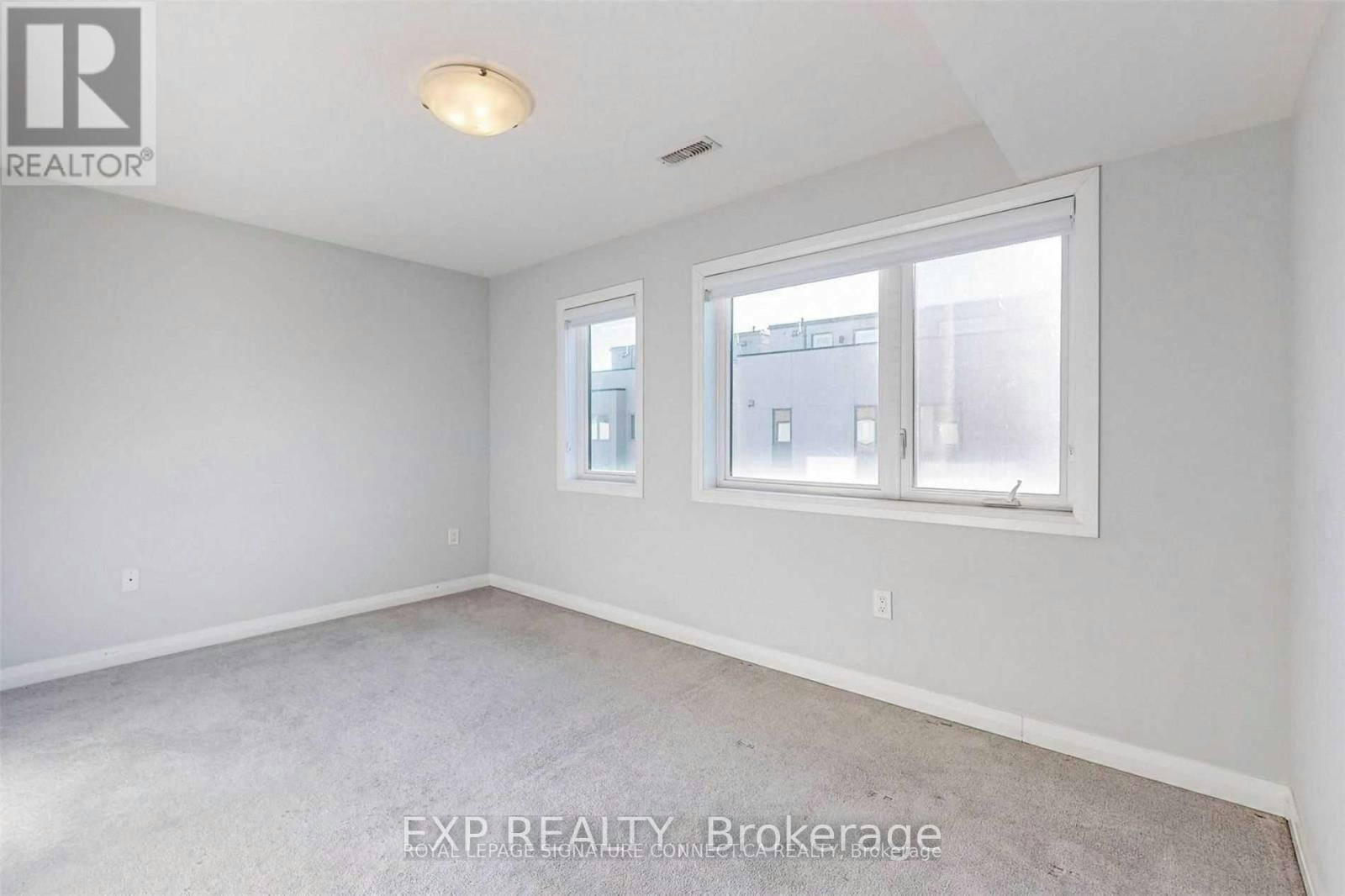 16 Caroline Carpenter Grove, Toronto, ON, M3K 0B1 - 2