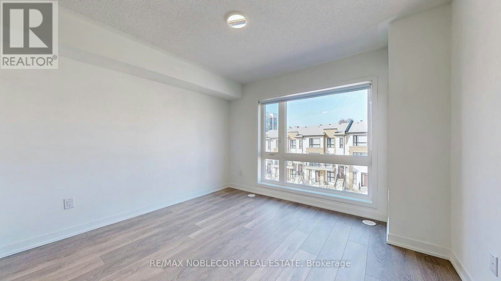 205-145 Canon Jackson Drive, Toronto, ON, M6M 2G1 - 17
