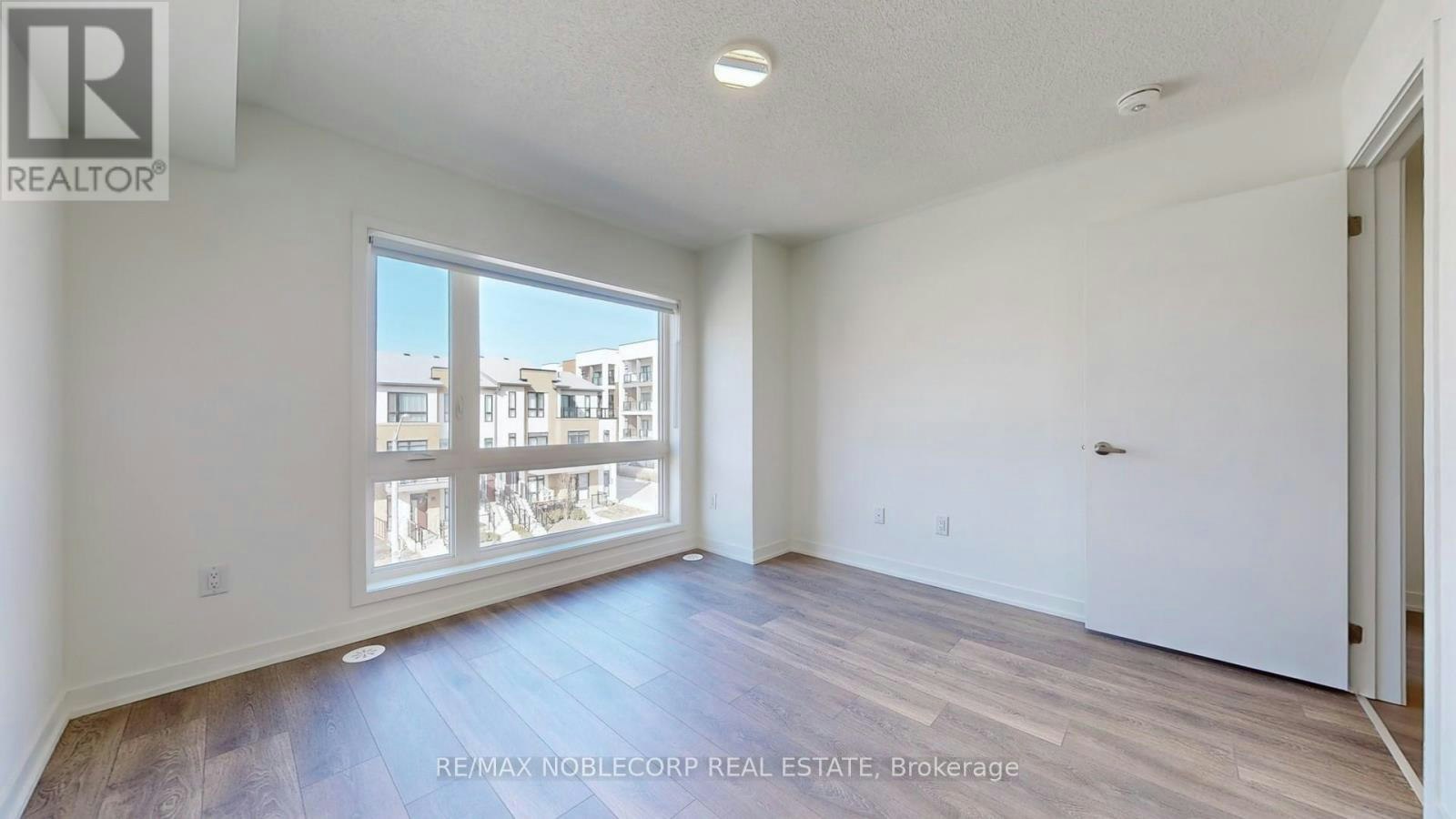 205-145 Canon Jackson Drive, Toronto, ON, M6M 2G1 - 18