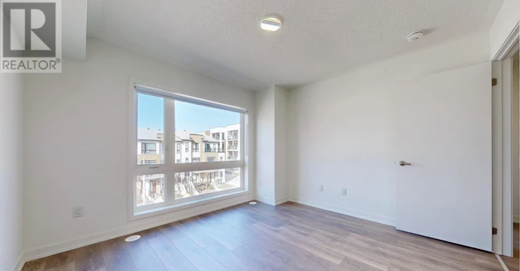 205-145 Canon Jackson Drive, Toronto, ON, M6M 2G1 - 18