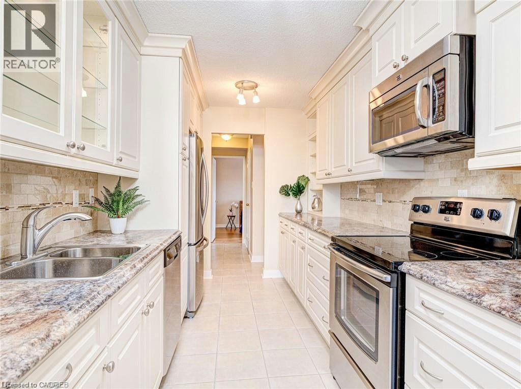 302-2055 Upper Middle Road, Burlington, ON, L7P 3P4 - 3