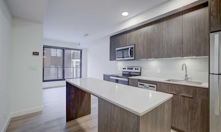 203-123 4 Street NE