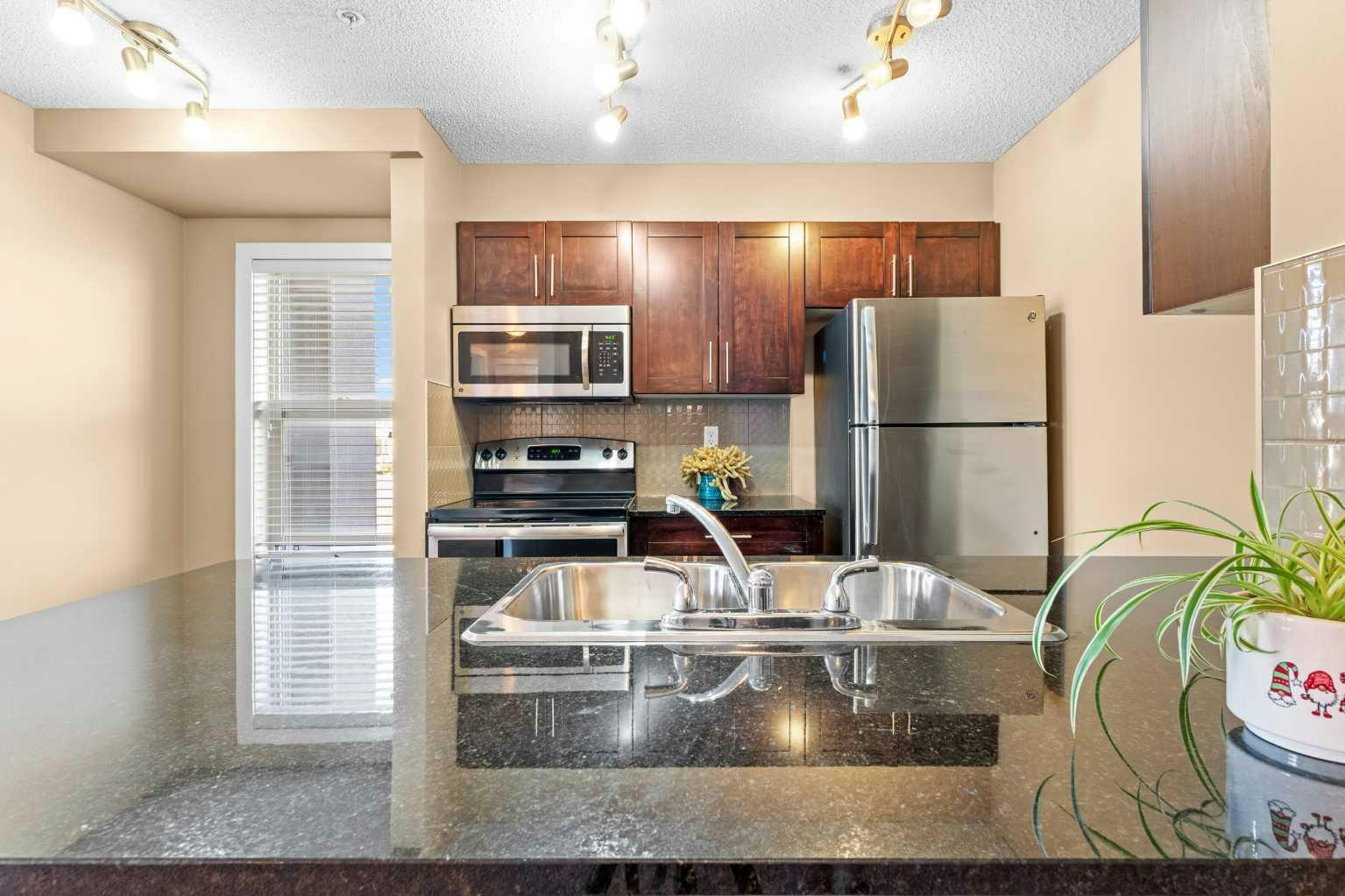7202-403 Mackenzie Way SW, Airdrie, AB, T4B 3V7