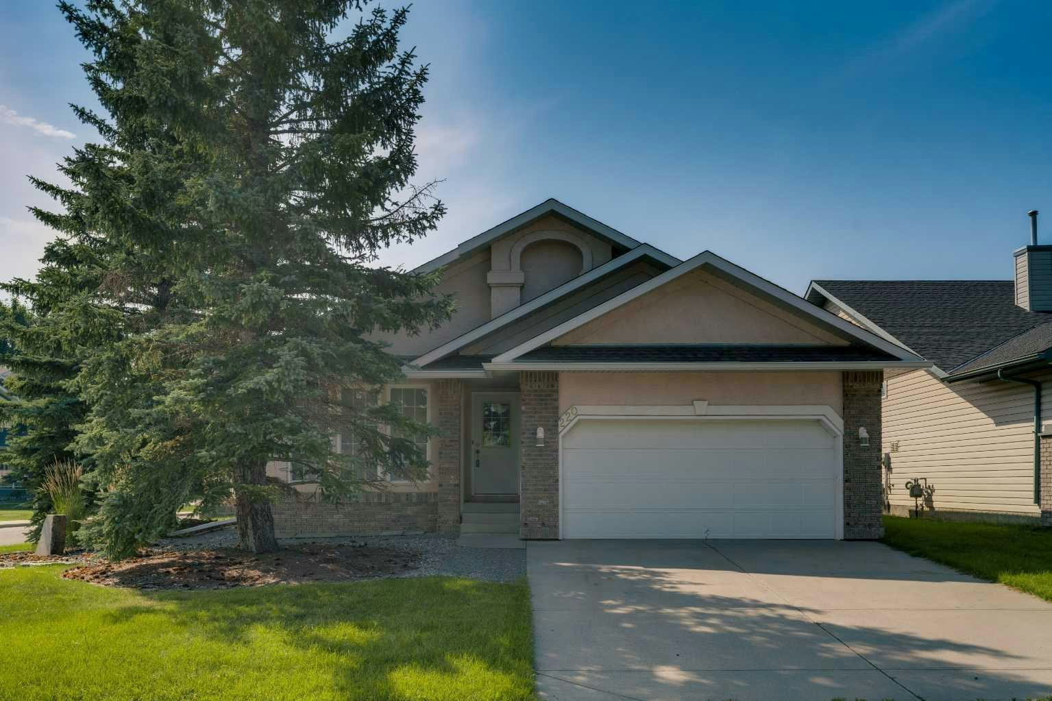 220 Cimarron Court, Okotoks, AB, T1S 1R7