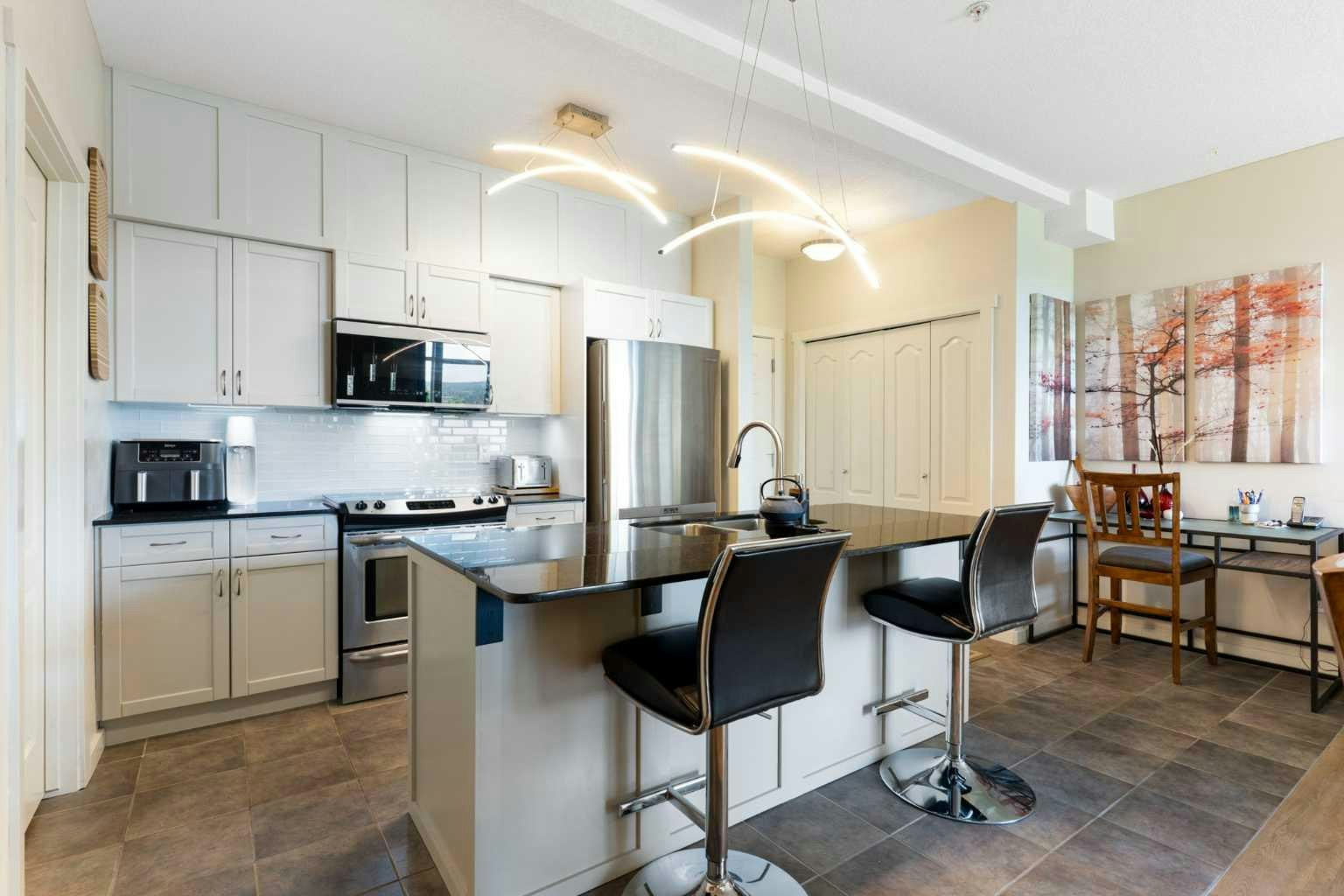 202-141 Mountain Street, Cochrane, AB, T4C 1Z5