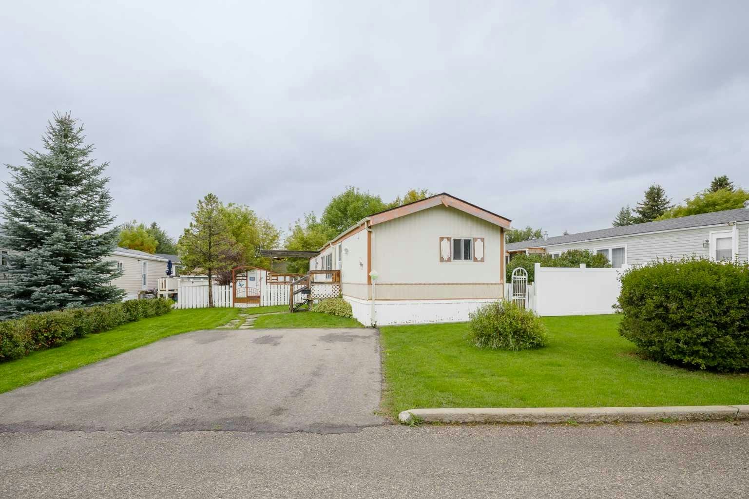 107 Heritage Drive, Okotoks, AB, T1S 1M4
