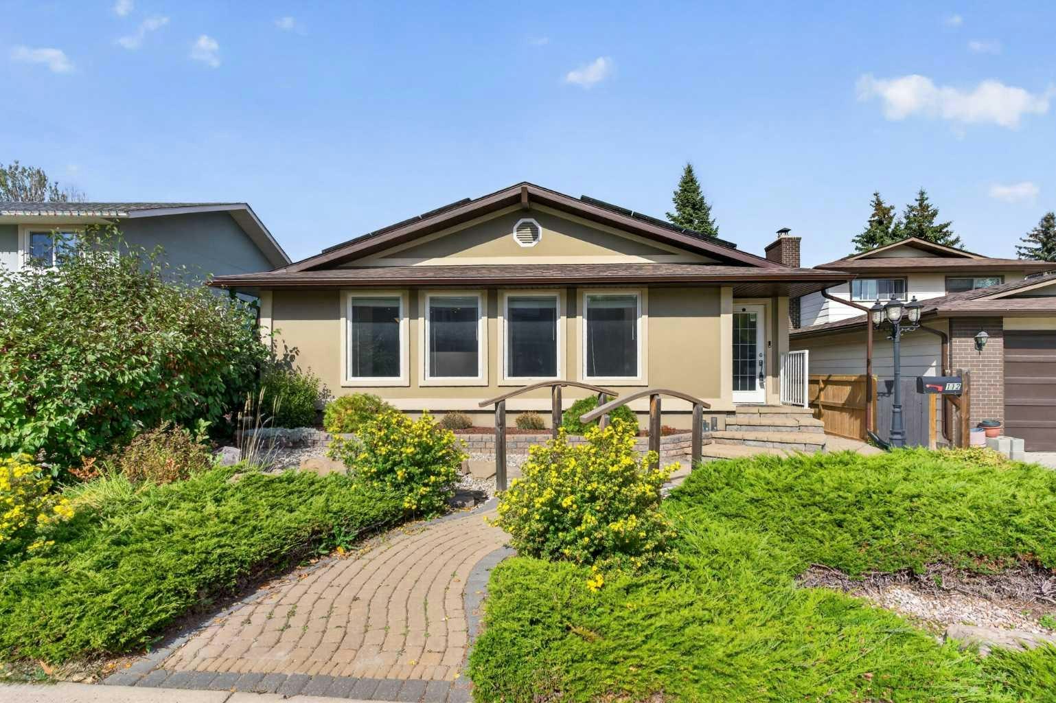 112 Beaconsfield Rise NW, Calgary, AB, T3K 1X4
