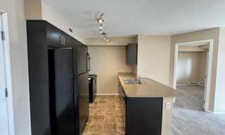 404-7130 80 Avenue NE