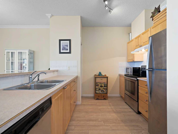 1310-1010 Arbour Lake Road NW, Calgary, AB, T3G 4Y6 - 3