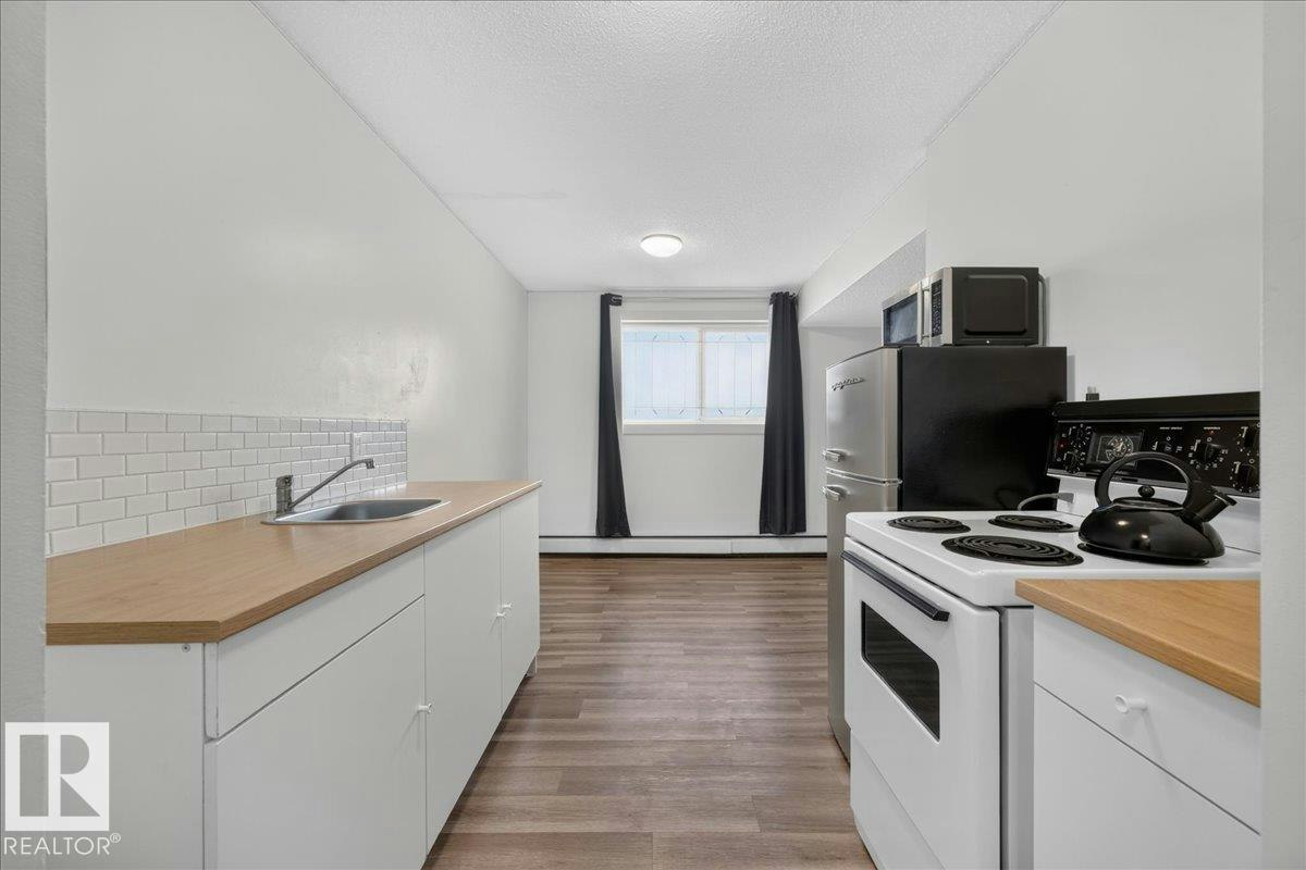 103-10725 111 Street, Edmonton, AB, T5H 3G2