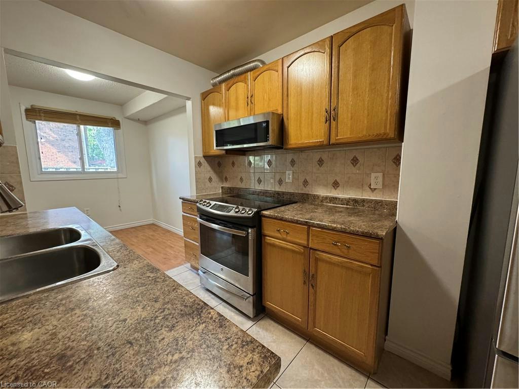 14-100 Quigley Road, Hamilton, ON, L8K 6J1 - 2