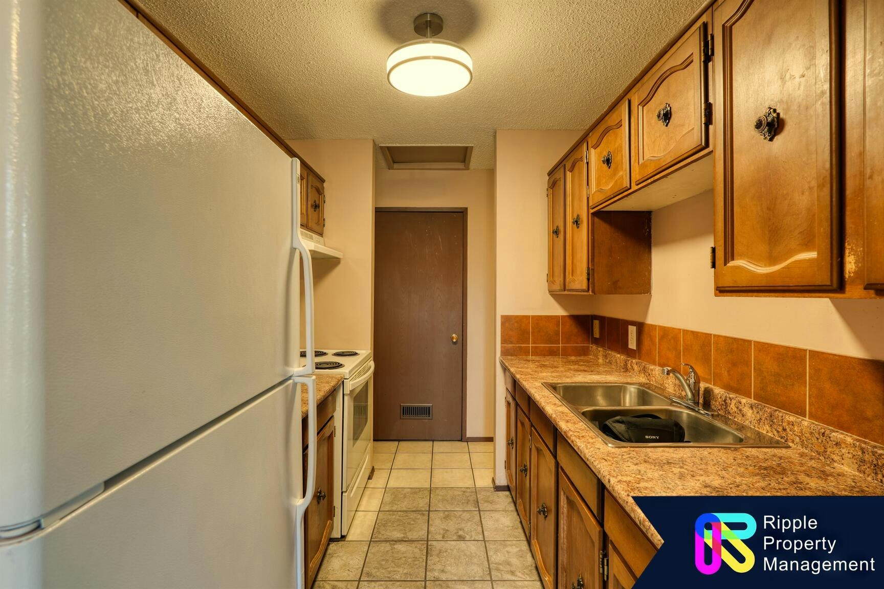 E-7712 Bowness Road Northwest, Calgary, AB, T3B 0H1 - 2