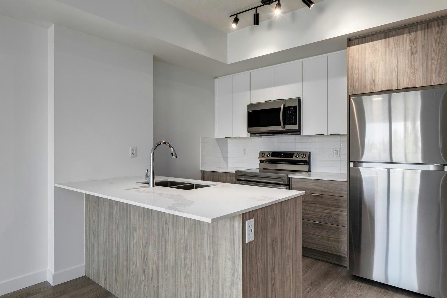 Floor plan B-3350 19 Street Southwest, Calgary, AB, T2T 6V7 - 4