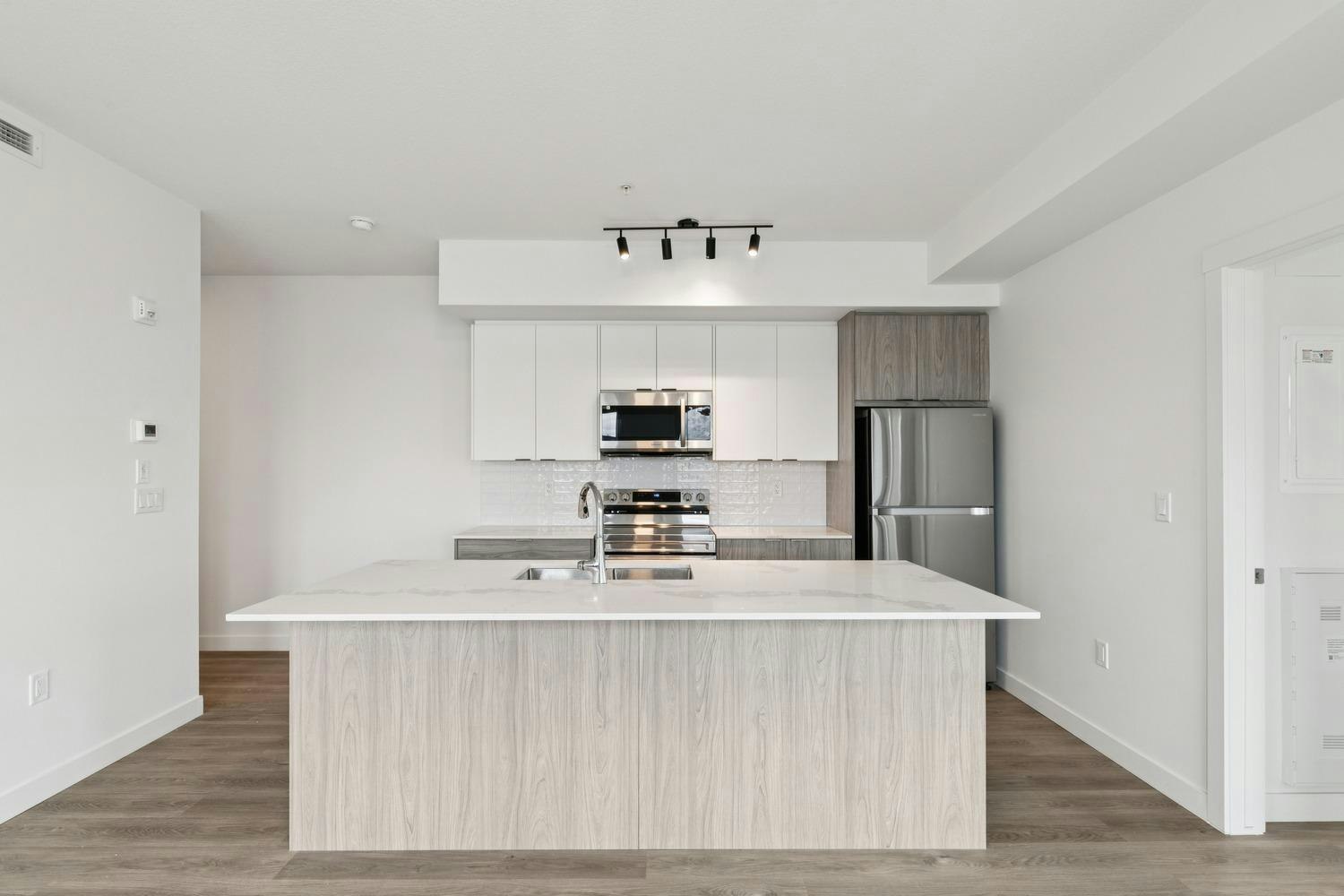 Floor plan E-3350 19 Street Southwest, Calgary, AB, T2T 6V7 - 11