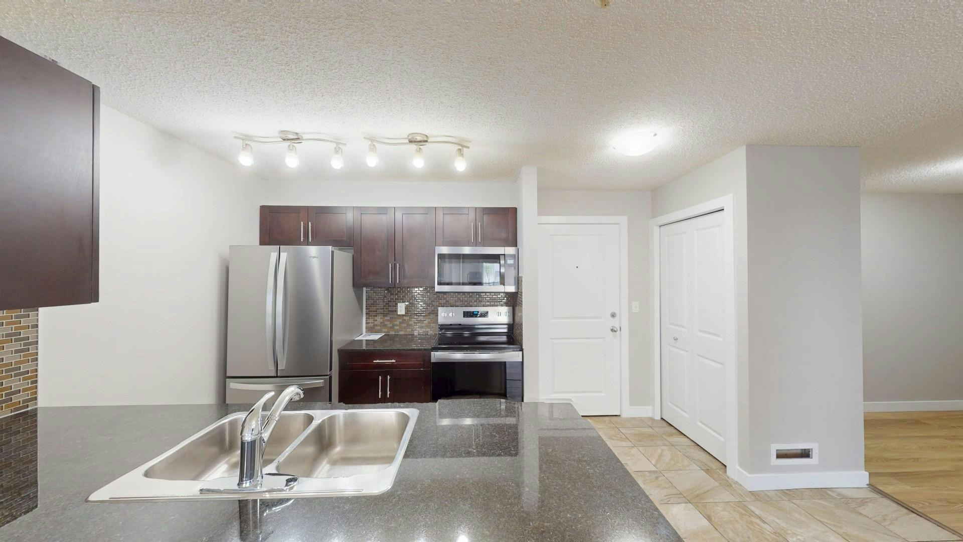81 Legacy Boulevard Southeast, Calgary, AB, T2X 2B9 - 5