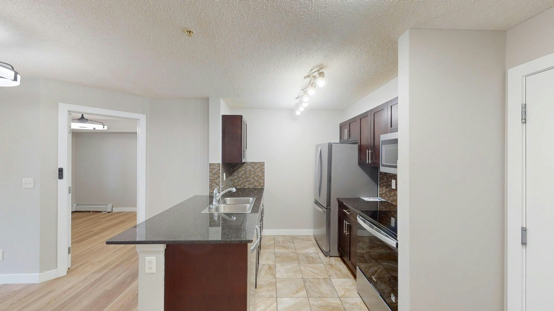 81 Legacy Boulevard Southeast, Calgary, AB, T2X 2B9 - 4