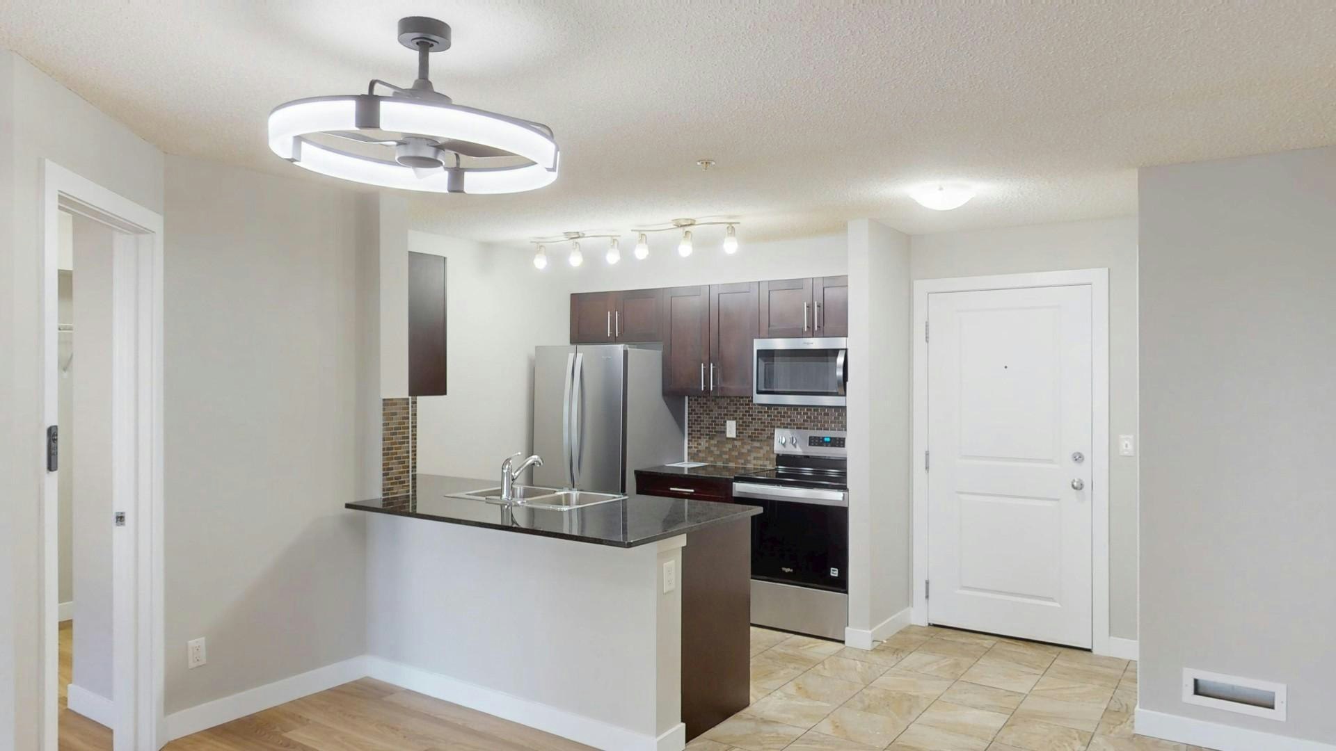 81 Legacy Boulevard Southeast, Calgary, AB, T2X 2B9 - 2