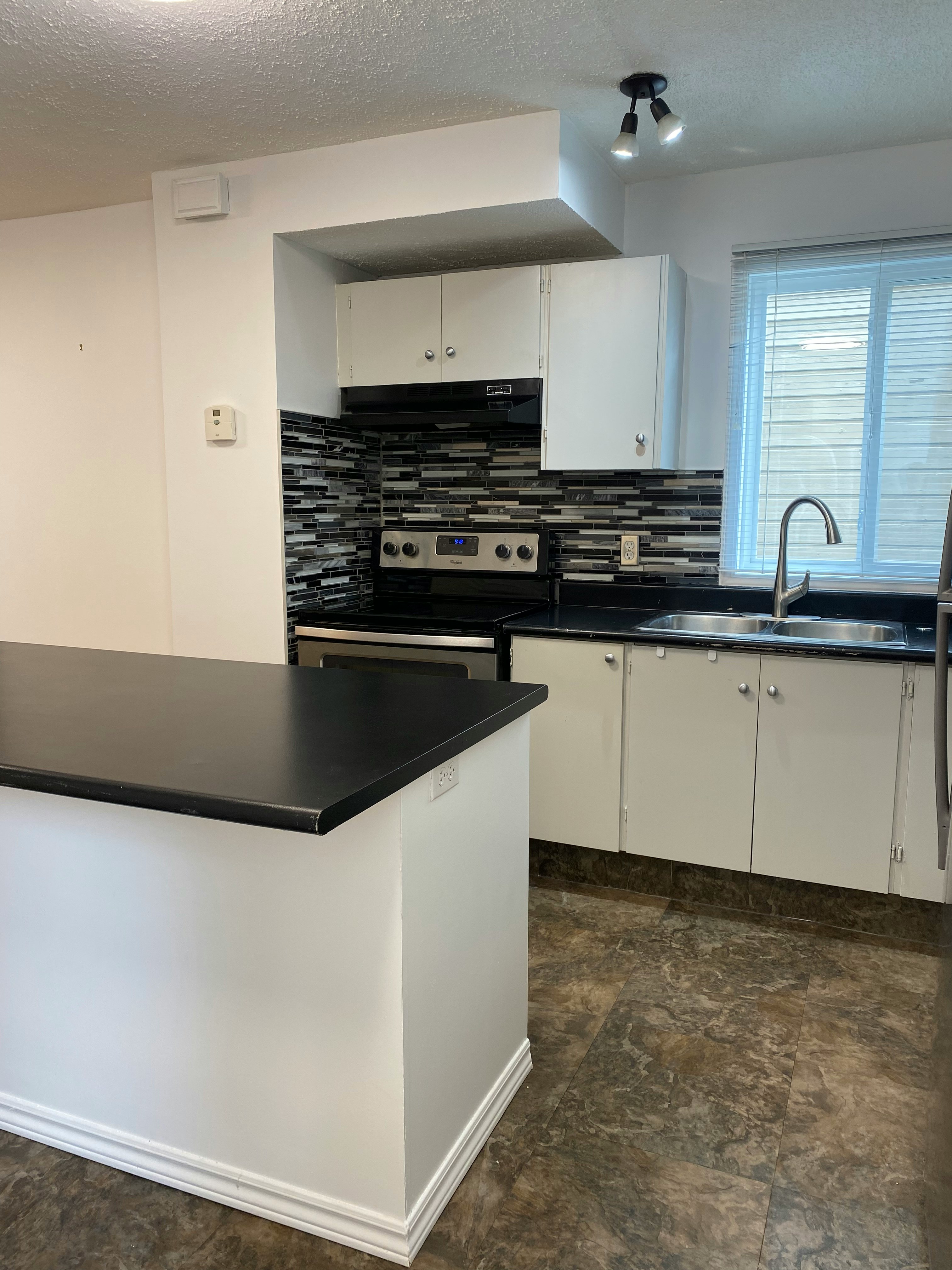 502-829 Coach Bluff Crescent Southwest, Calgary, AB, T3H 1B1