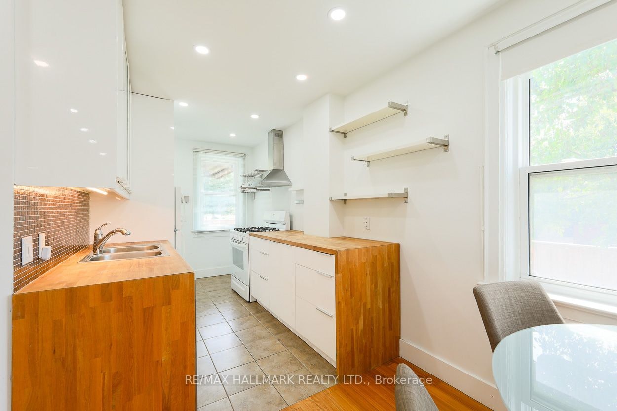 Main-2159 Gerrard Street E, Toronto, ON, M4E 2C4 - 3