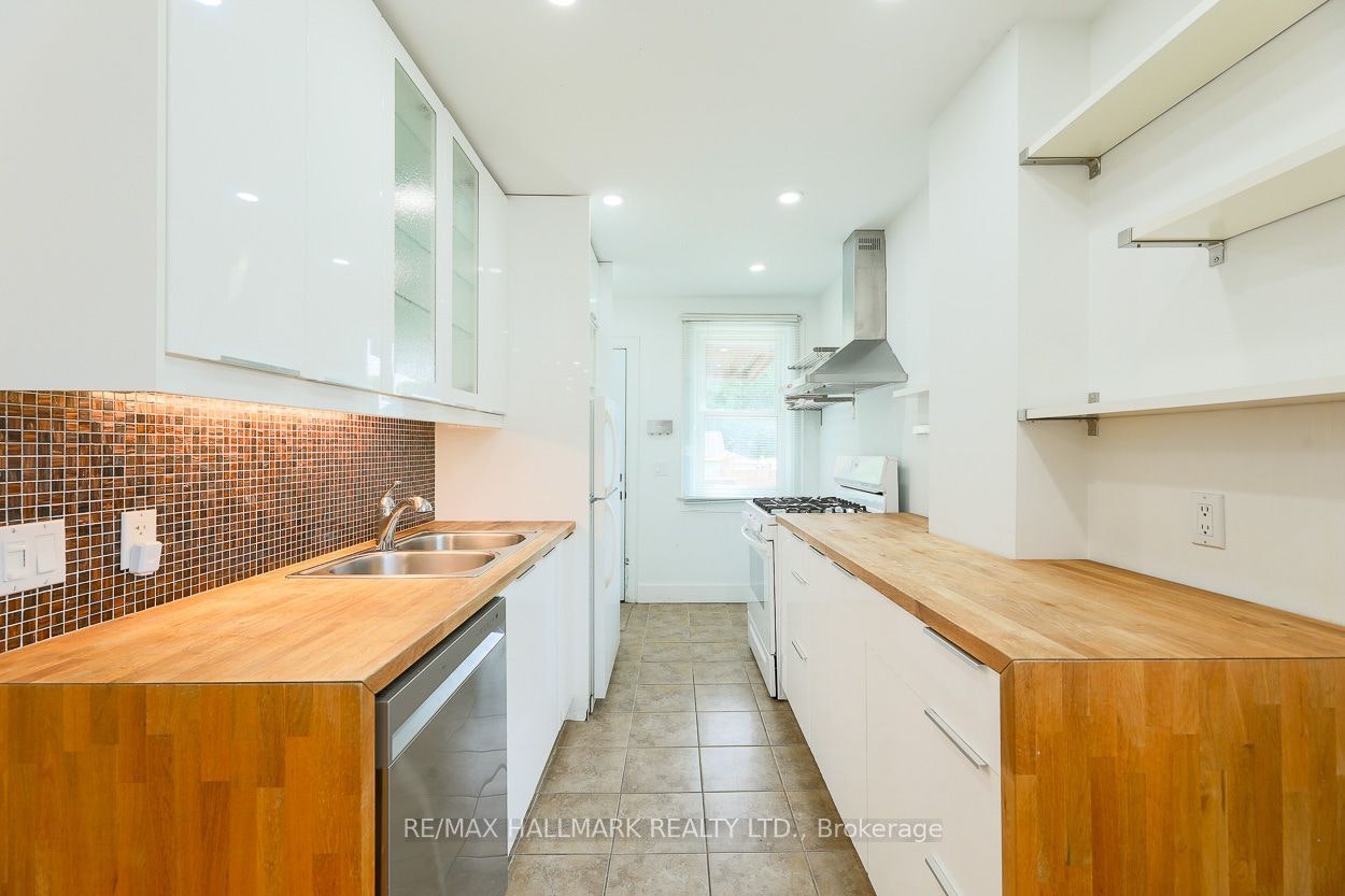 Main-2159 Gerrard Street E, Toronto, ON, M4E 2C4 - 2